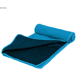 A sky blue cooling towel rolled partially open, featuring a textured surface on one side and a smooth side. It has a logo.