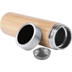 A drink bottle with a bamboo exterior, silver accents, and a removable strainer component.