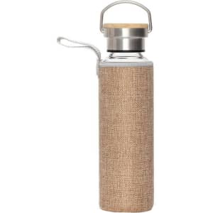 A drink bottle with a stainless steel top, wooden lid, and a textured beige fabric cover. It features a handle and a strap.