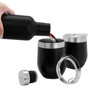 A drink bottle in matte black pouring liquid into a black wine tumbler with a silver rim and lid.