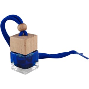 A blue car reed diffuser in a square glass bottle with a wooden top and a blue cord.