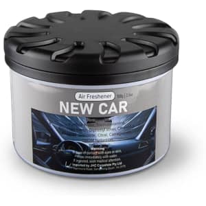 A black-lidded container of air freshener with a label featuring a car interior design.
