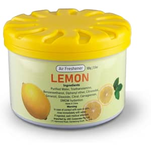 A cylindrical container of air freshener in yellow, with a lemon scent, featuring a logo and ingredients list.