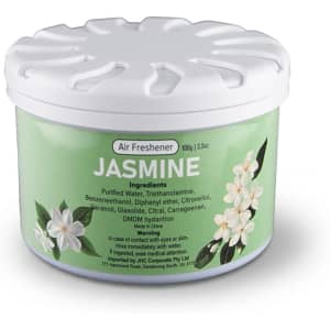 A round, white container of jasmine air freshener with a floral design and a branding logo.