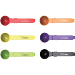 A set of six measuring spoons in red, orange, yellow, green, purple, and black, with a logo on the handle.