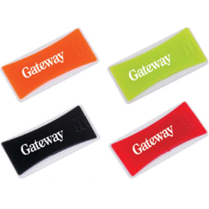 A set of four webcam covers in orange, green, black, and red, featuring a logo.