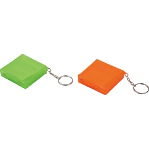 A green and an orange square case with a keychain, designed for holding alcohol pads.