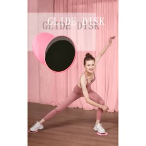 A pink glide disk with a black underside beside a person demonstrating a fitness pose in a pink outfit.