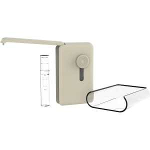 A beige screen cleaner with a pump mechanism alongside a clear, curved brush container. Features a logo on the cleaner.