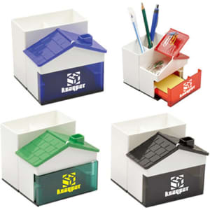 A pen holder and memo holder with clips in blue, green, red, and black, featuring a house design and a logo.