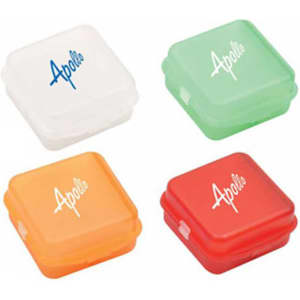 A set of four pill boxes in white, green, orange, and red, featuring a logo on each box.