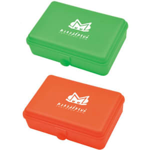 A green and orange three-part lunch box with a logo on the lid. It features a secure closure and compartments.