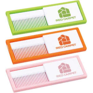 A set of three combs in green, orange, and pink, each with a white casing featuring a logo.