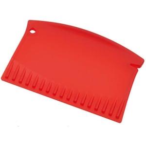 A red ice scraper with a curved edge and teeth along one side. It features a hole for hanging.