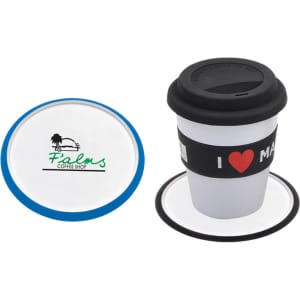 A set of coasters featuring a blue and black rim, with a white surface and a drink bottle on one coaster.