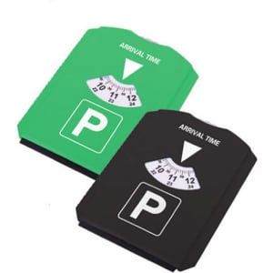 Two parking signs in green and black, featuring an arrival time indicator and a 'P' symbol. Both have a logo.