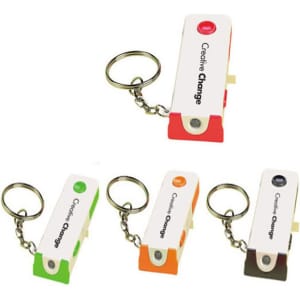 A keychain light in four colours: green, orange, white, and black, featuring a small branding logo.