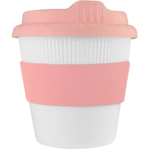 A reusable coffee cup in white with a pink silicone lid and band, featuring a logo.