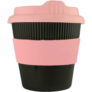 A reusable coffee cup in black with a pink silicone band and lid, featuring a ribbed design and branding.