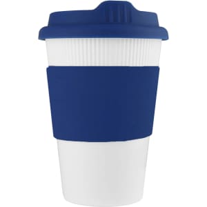 A coffee cup in white with a navy blue silicone sleeve and lid, featuring a logo.