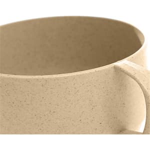 A reusable coffee cup in a light beige colour, featuring a handle and made from wheat straw material.
