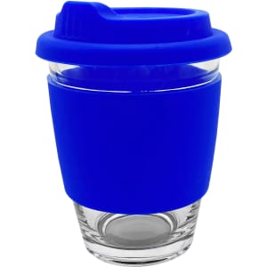 A reusable coffee cup in clear glass with a bright blue silicone sleeve and lid. It features a logo on the sleeve.