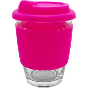 A reusable coffee cup with a clear glass body and a bright pink silicone sleeve and lid. It features a logo.