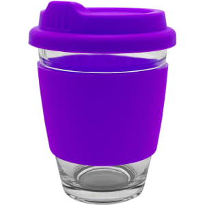 A reusable coffee cup with a clear glass body and a bright purple silicone sleeve and lid. It features a logo.