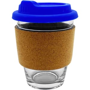 A reusable glass coffee cup featuring a blue lid and cork sleeve for insulation. It includes a logo.