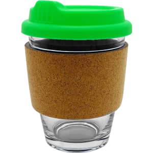 A glass coffee cup with a cork sleeve and a bright green lid. It features a branding logo.