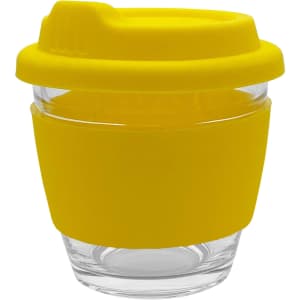 A yellow reusable coffee cup with a silicone sleeve and lid, featuring a transparent glass body.