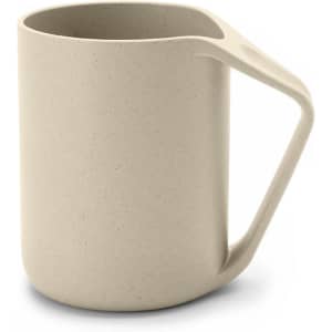 A reusable coffee cup in beige with a sturdy handle and a simple, modern design. It features a logo.