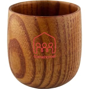A small wooden coffee cup with a natural wood finish and rounded shape, featuring a logo.