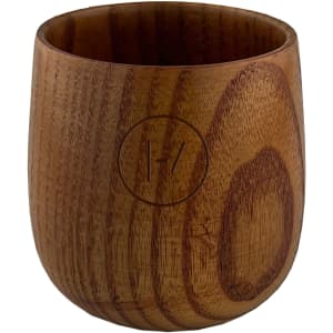 A wooden coffee cup in a warm brown tone, featuring a circular logo on the side.