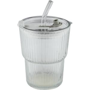 A glass ice coffee cup in clear with a ribbed design and a straw, featuring a lid and a built-in spout.
