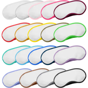 A collection of eye masks in various colours, featuring a soft surface and contrasting edges. Some have branding.