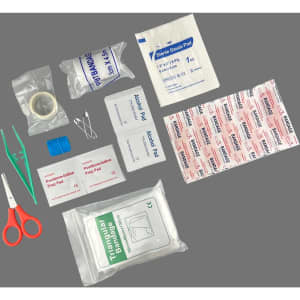 A red and white first aid pouch containing bandages, adhesive pads, scissors, tweezers, and safety pins.