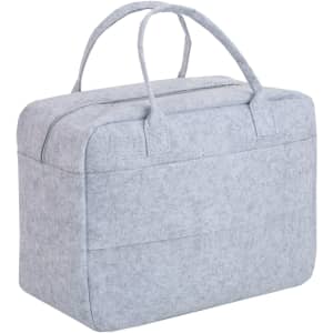 A grey felt travel bag with two handles and a zip closure, featuring a front pocket and a minimalistic design.