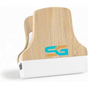 A bamboo fridge magnet clip with a white base and a logo on the front.