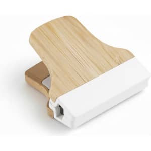 A bamboo fridge magnet clip with a natural wood finish and a white base, designed for holding notes or papers.