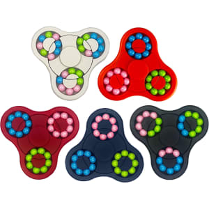 A set of five fidget spinners in red, navy, grey, maroon, and black, each featuring colourful buttons.
