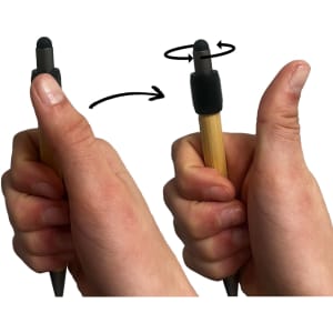 A bamboo stylus pen with a spinning fidget feature, held between two hands. The pen has a black tip and grip.