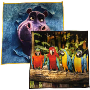 A Face Washer featuring a blue and purple hippo design on one side and colourful parrots on the other, with a logo.
