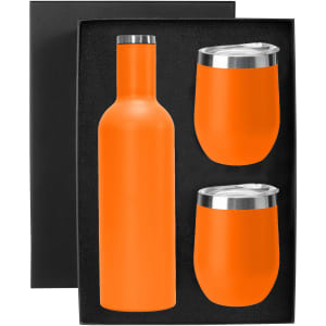 A drink bottle and two cups in bright orange, presented in a black gift box, featuring a logo.