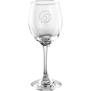 A clear glass wine glass with an engraved design on the bowl and a tall, elegant stem.