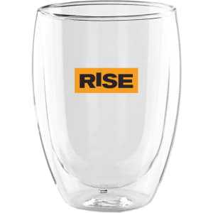 A double wall glass in clear colour with a logo featuring the word "RISE" in orange.