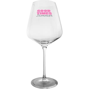A clear wine glass with a wide bowl and tall stem, featuring a logo in pink.