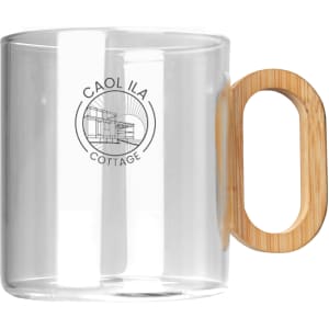A transparent glass coffee cup with a bamboo handle and a circular logo on the side.