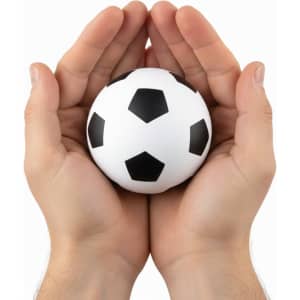 A high bounce soccer ball in white with black pentagon panels, held in two hands.