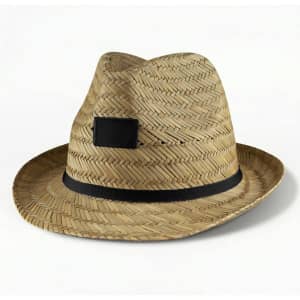 A Panama straw hat in a natural tan colour with a black band and a patch on the side.